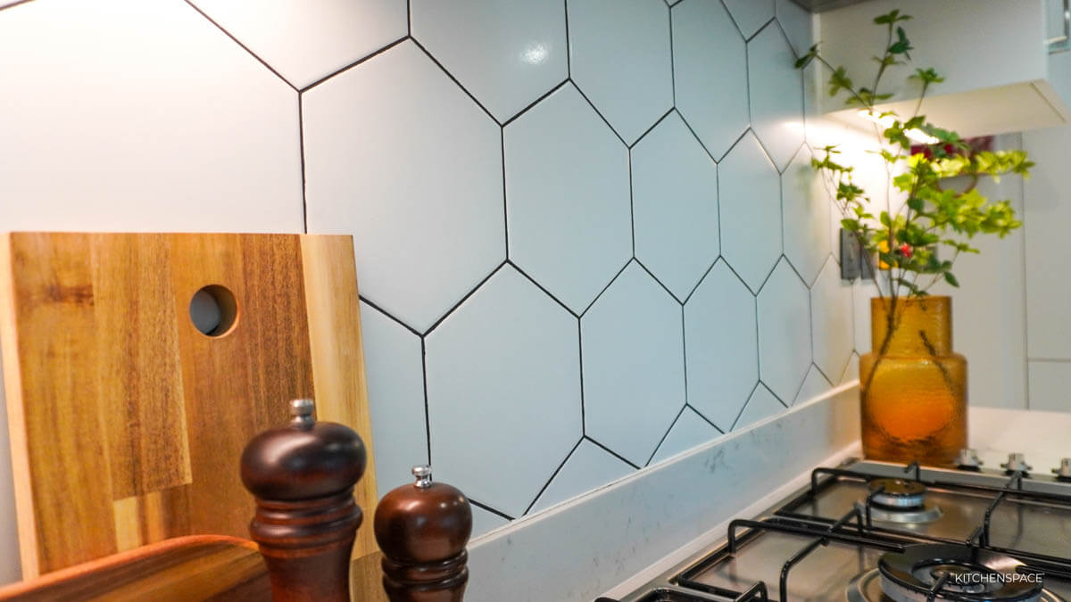 Walnut Kitchen with Geometric Backsplash